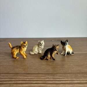 Four Small Plastic Cat Figures Made In Hong Kong